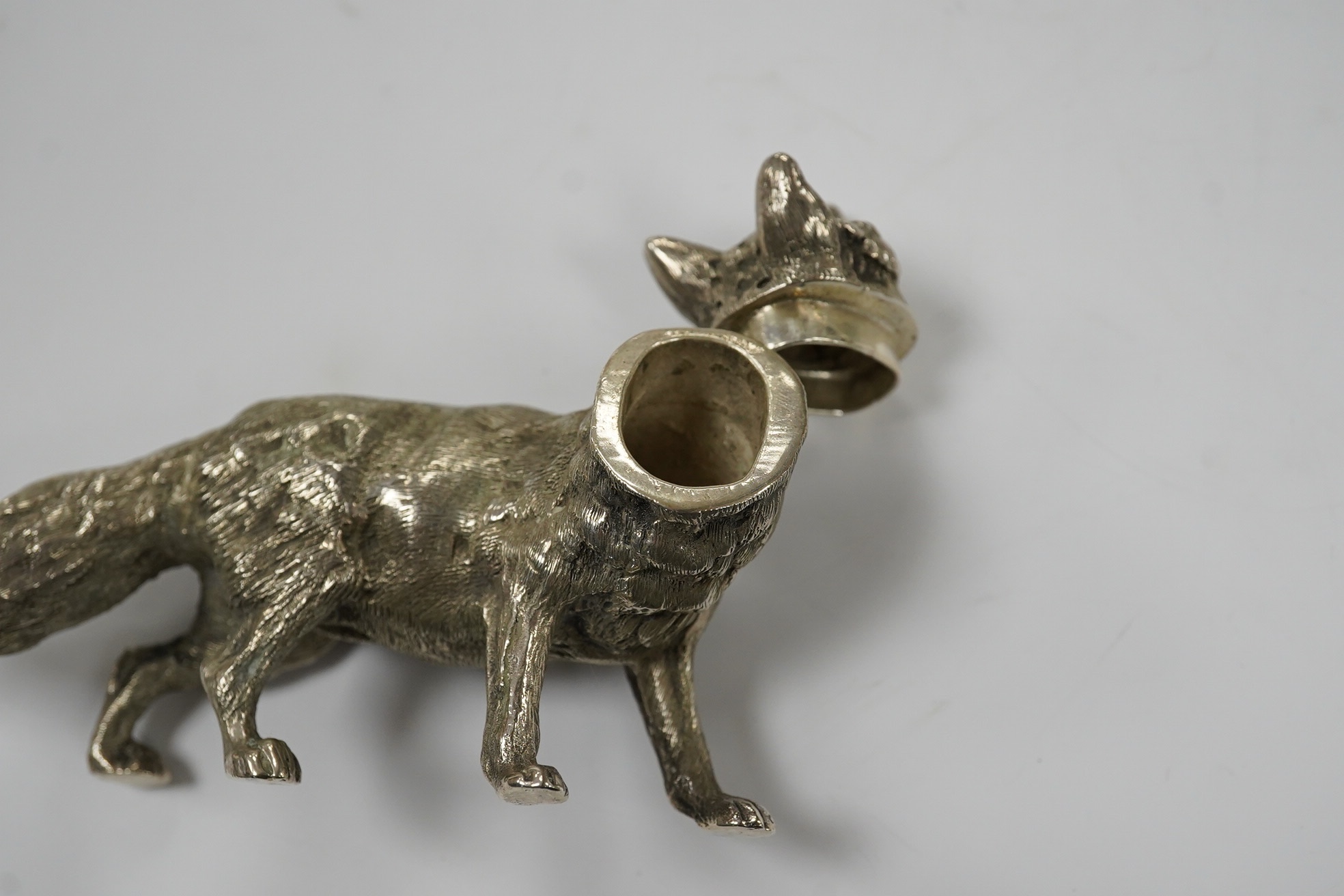 An Elizabeth II novelty silver condiment, modelled as a free standing fox, maker SMD Castings?, London, 1970, length 10.7cm, 4.3oz. Condition - fair to good